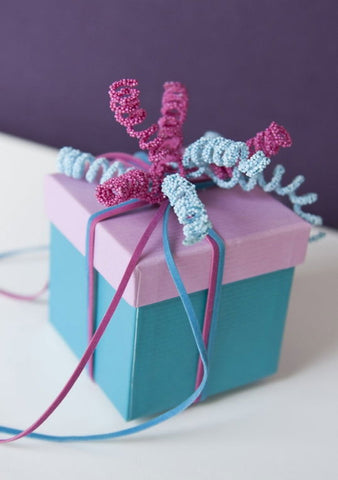 Kadodecoratie Curls pins Wit - Kadopapier.net Kadodecoratie Curls pins Wit - Kadopapier.net